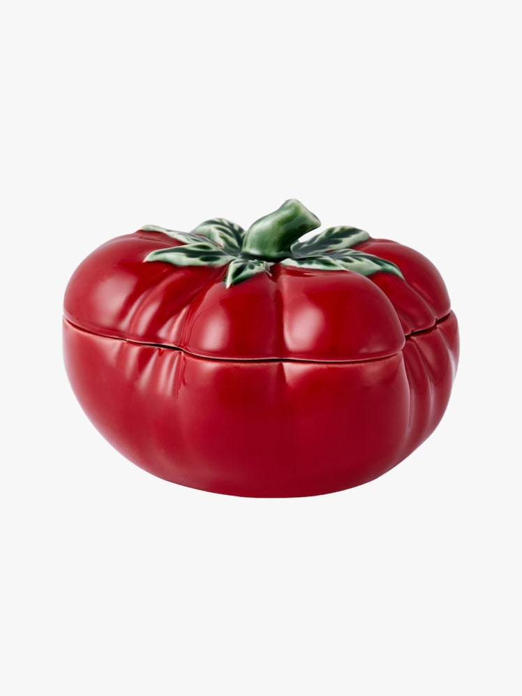 Ceramic jar shaped like a tomato.