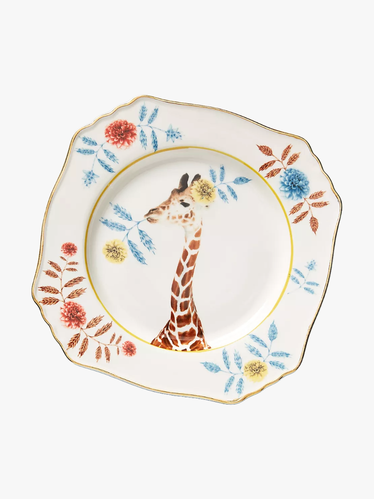 Image may contain Art Porcelain Pottery Plate Food Meal Dish Food Presentation and Handicraft