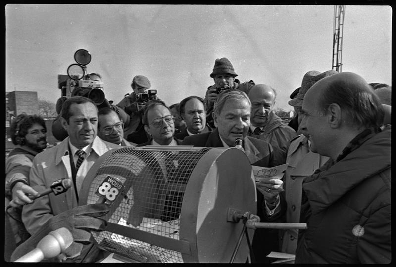 blackandwhite image of Mayor Ed Koch Governor Mario Cuomo former HPD Commissioner Anthony Gliedman picking a housing...