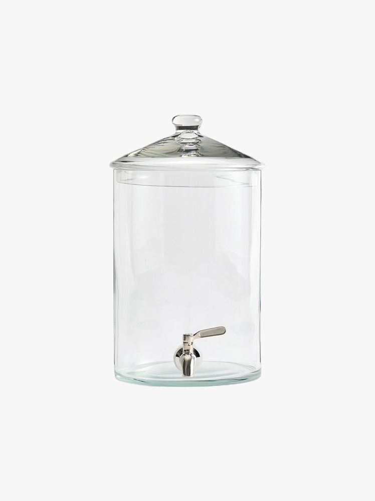 Cylindrical glass drink dispenser with metal spigot.