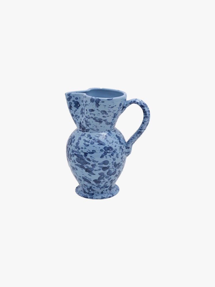 Blue splattered ceramic pitcher.