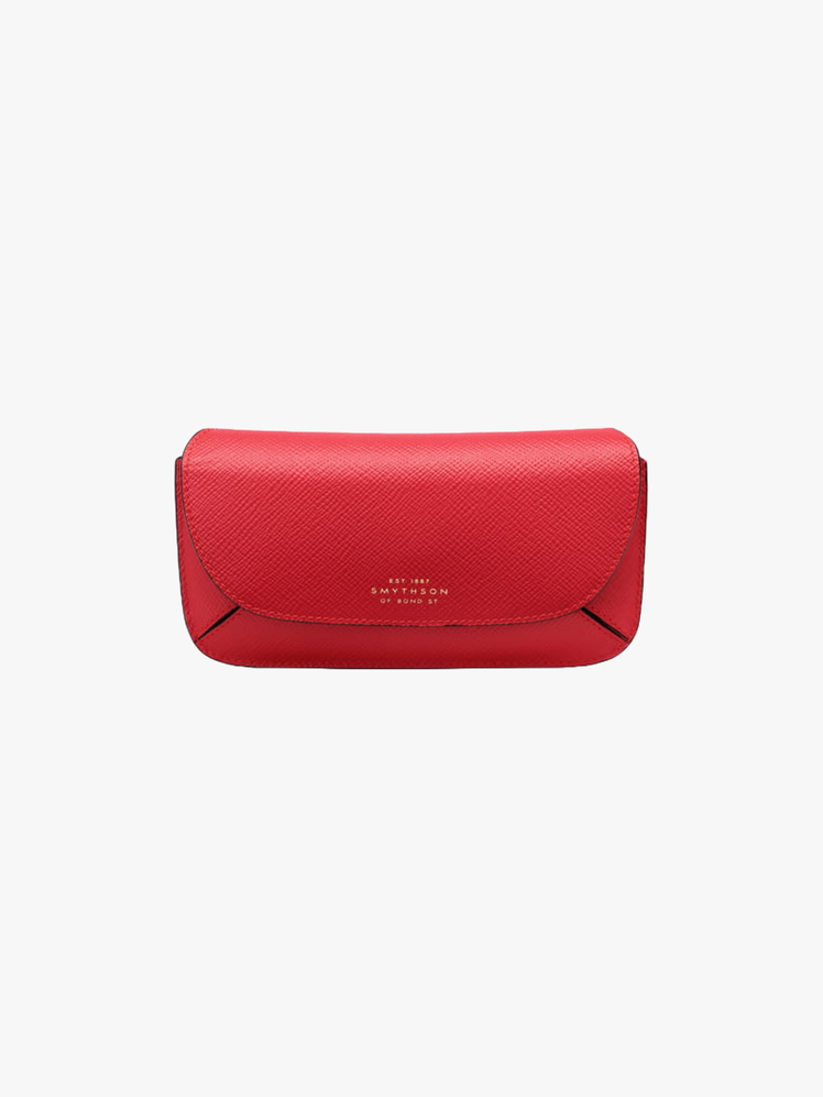 Red leather sunglasses case with Smythson embossing in gold.