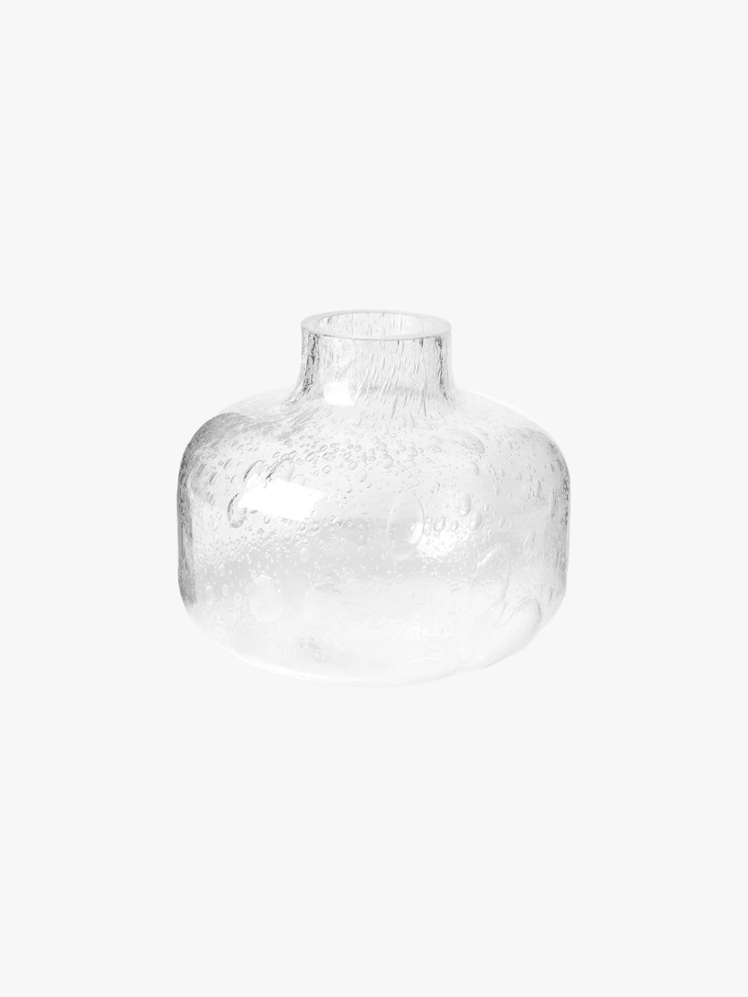 Bubbled clear glass vase with rounded soft design inspired by the shape of an apple.