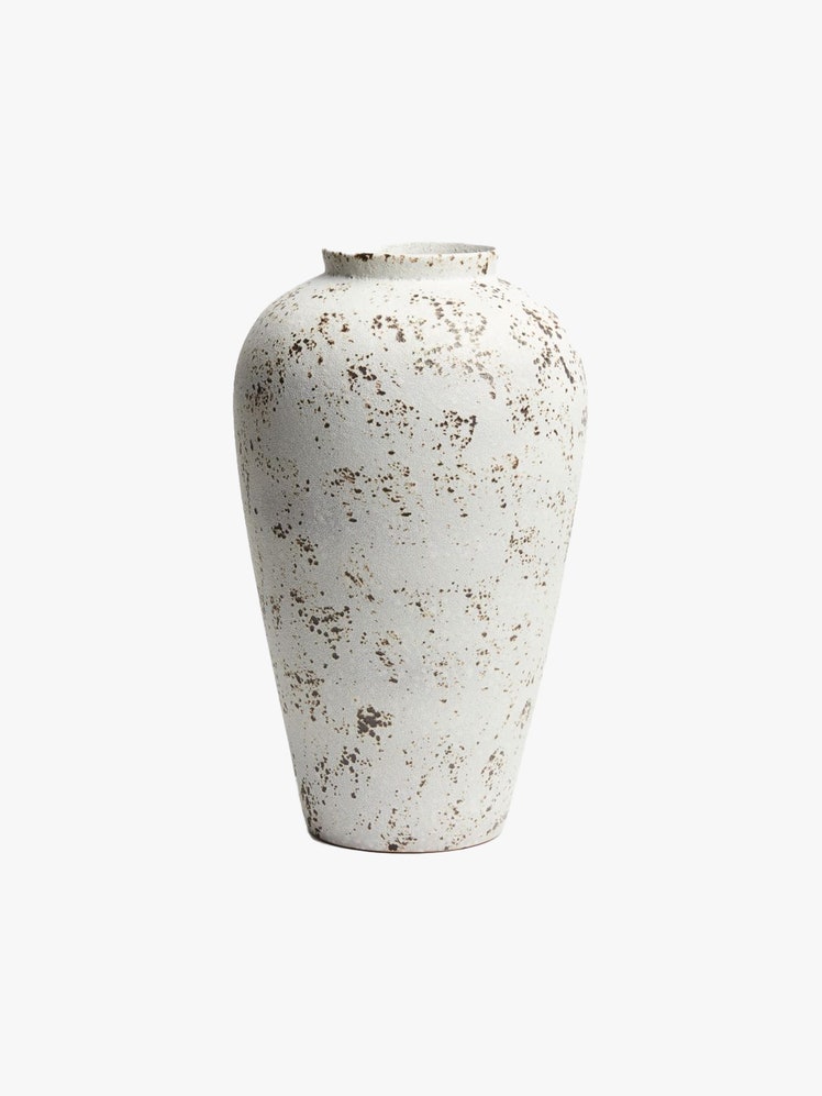 Large white terracotta vase with speckled glaze.