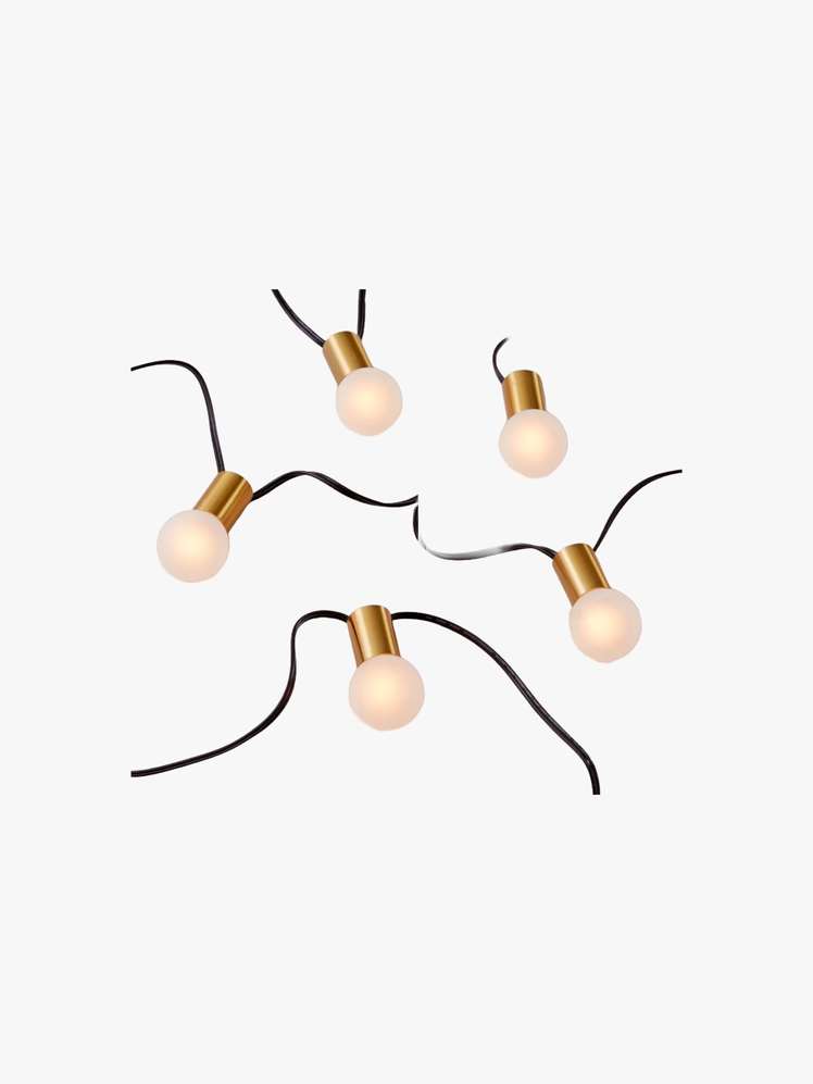 String lights with stainless steel at ends of lightbulbs.