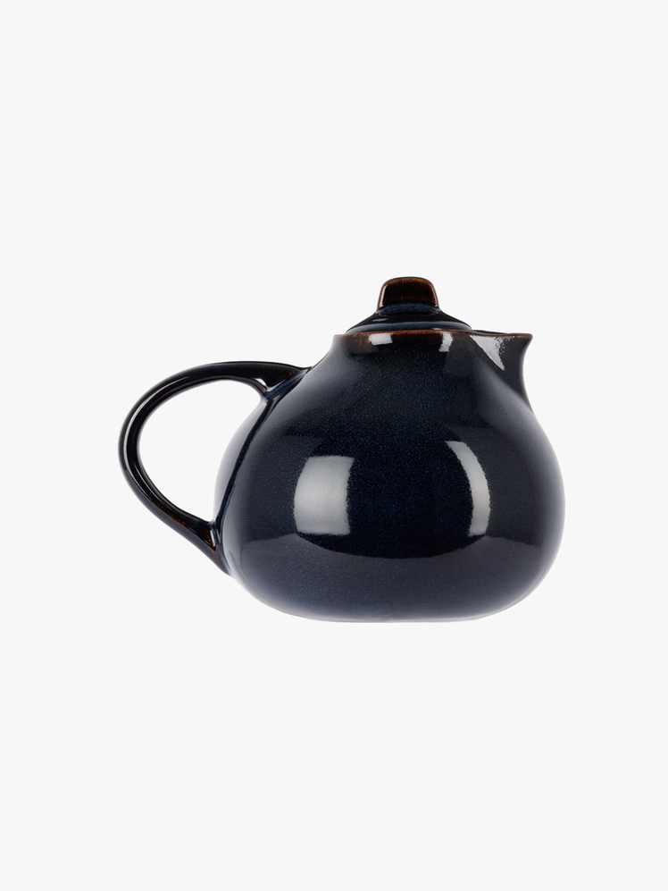 Handcrafted glazed stoneware teapot.