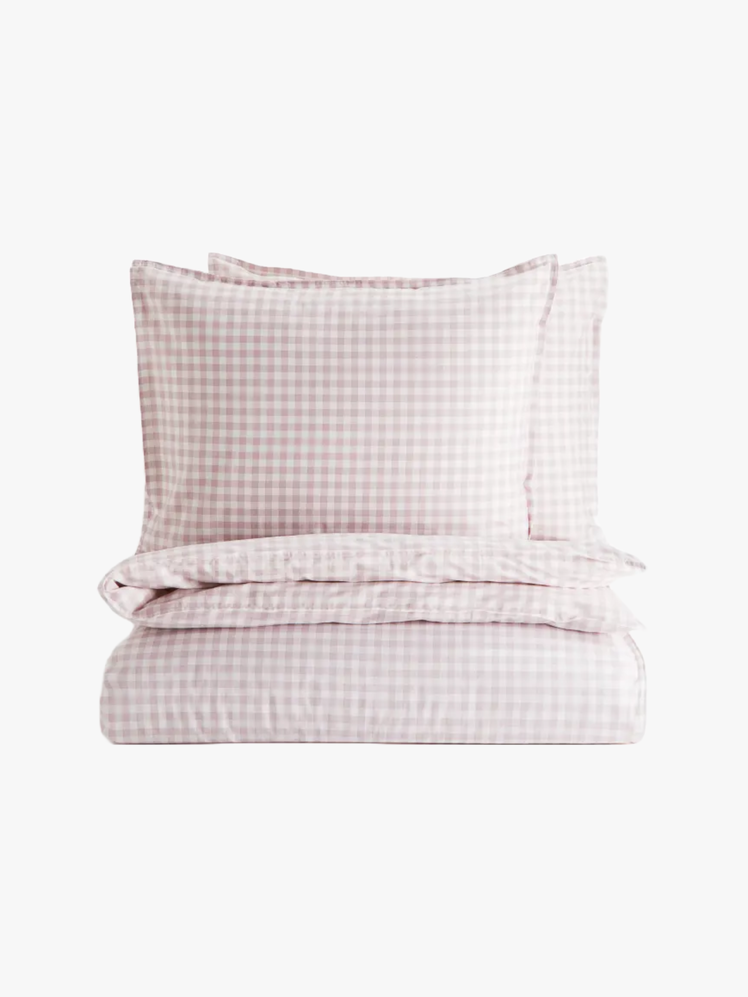 Duvet cover and two pillow cases in a pink gingham pattern.