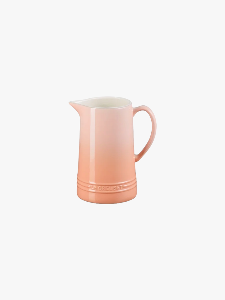 A stoneware Pitcher inspired by iconic midcentury design.