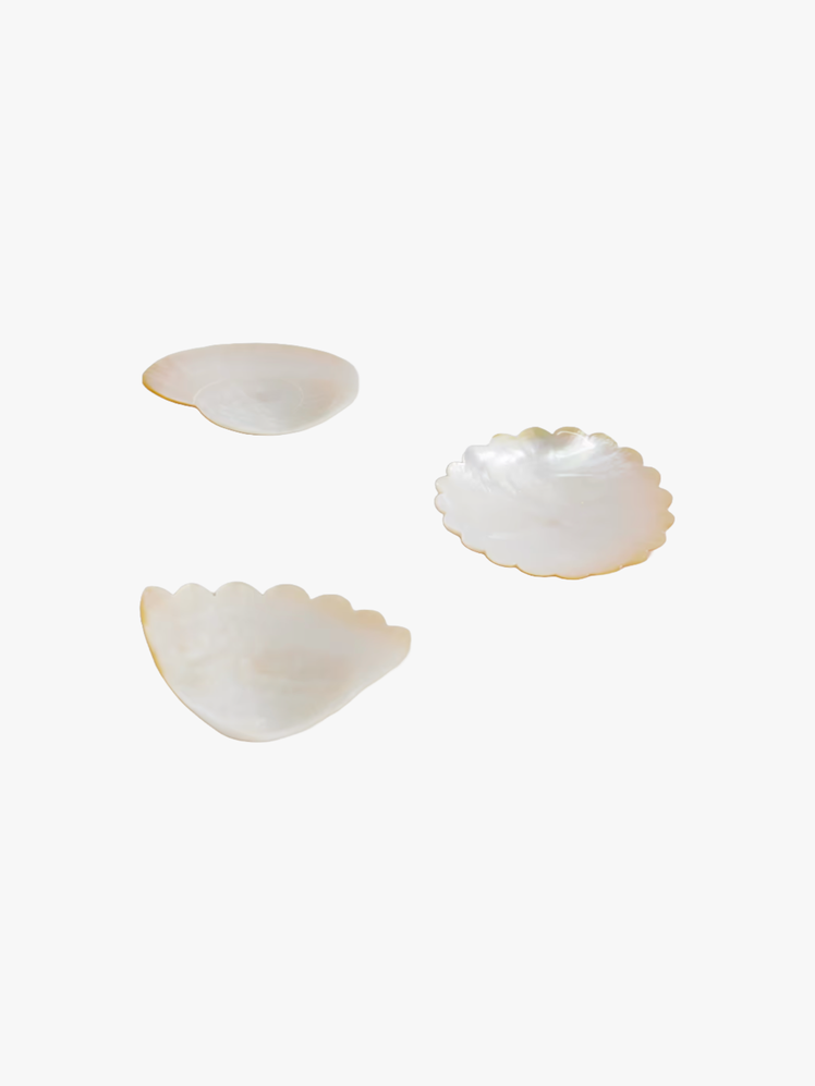 Set of three MotherofPearl Dishes with scalloped edges.