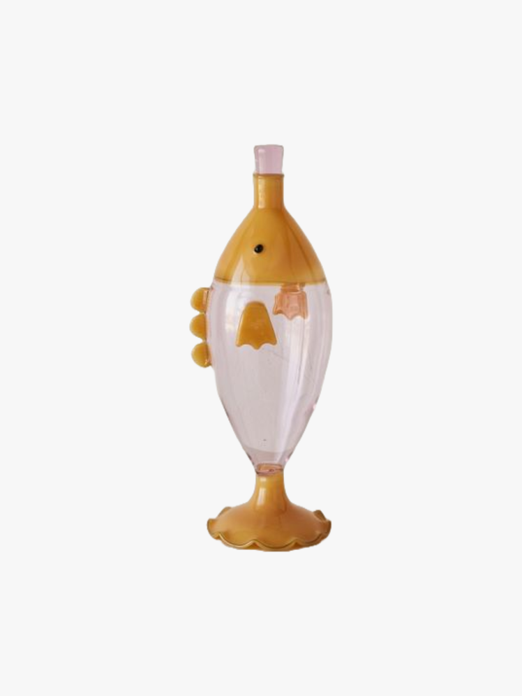 Pink and orange glass carafe shaped like a fish.