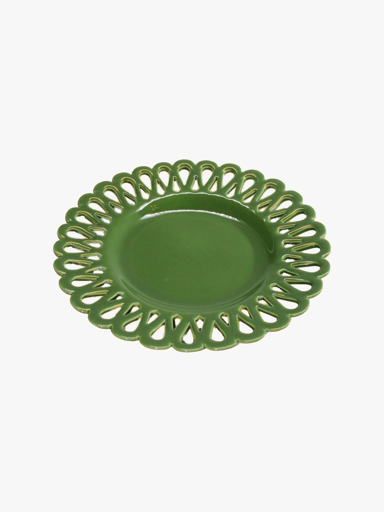 Green ceramic plate with openwork border.