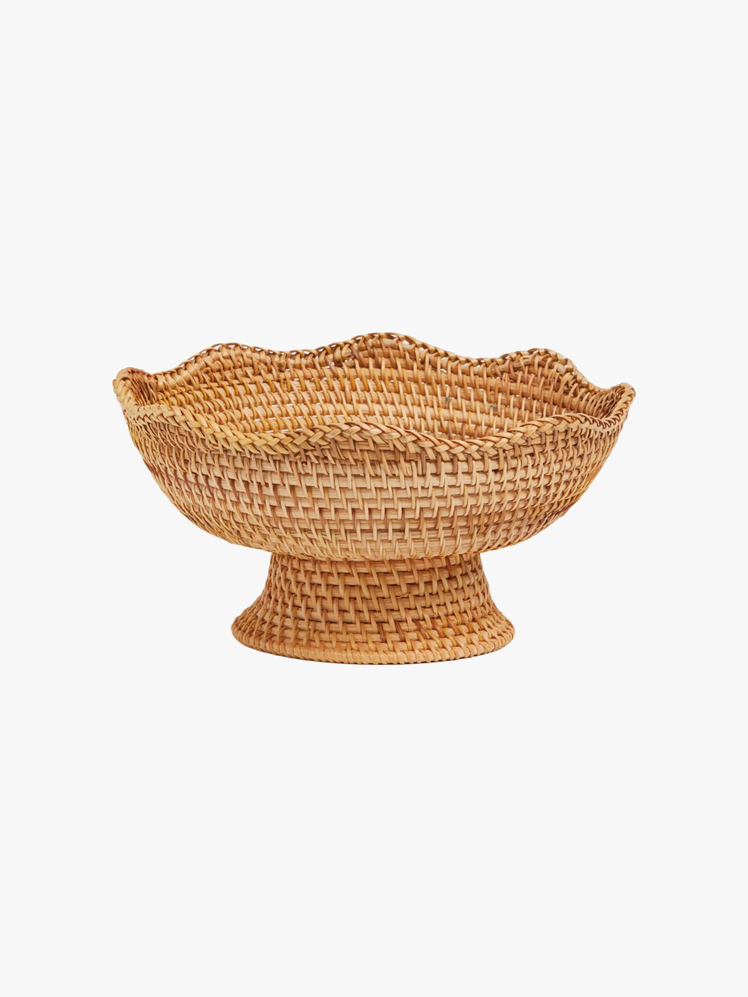 Rattan footed bowl with scalloped lip.