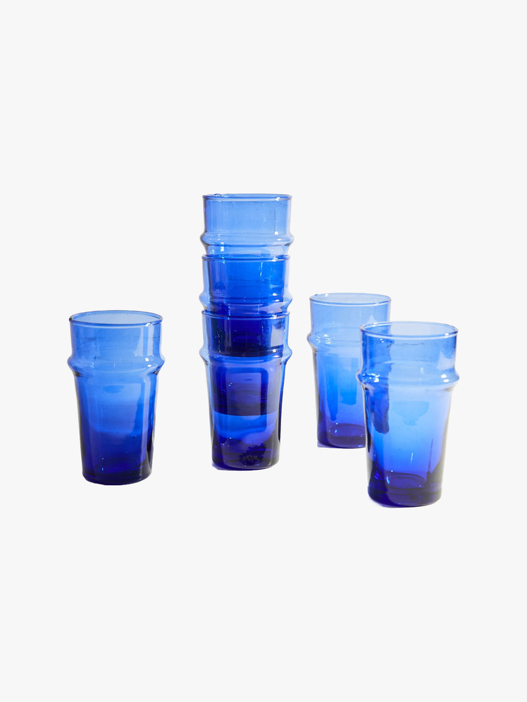 Set of 6 blue drinking glasses with three in a stack.