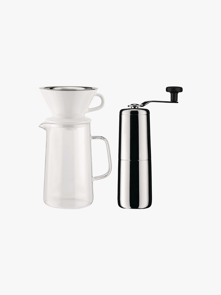 Stainless steel coffee grinder and filter glass pitcher and porcelain holder.