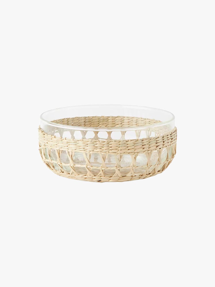 Bowl made from natural seagrass handwoven around recycled glass.