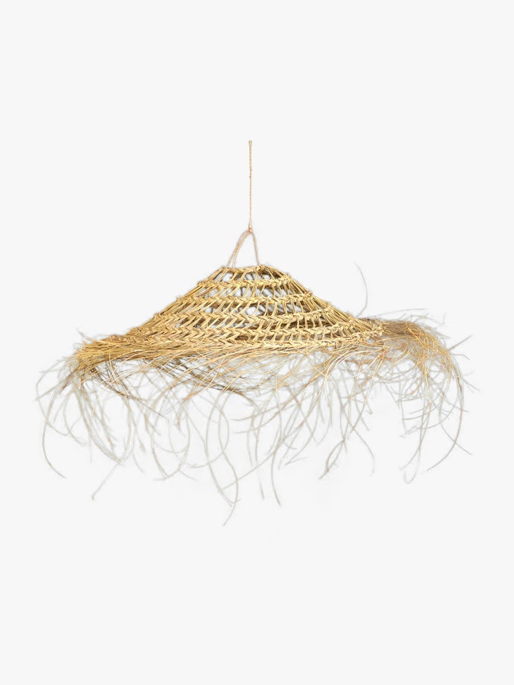 Hand woven doum alfa fiber pendant light.