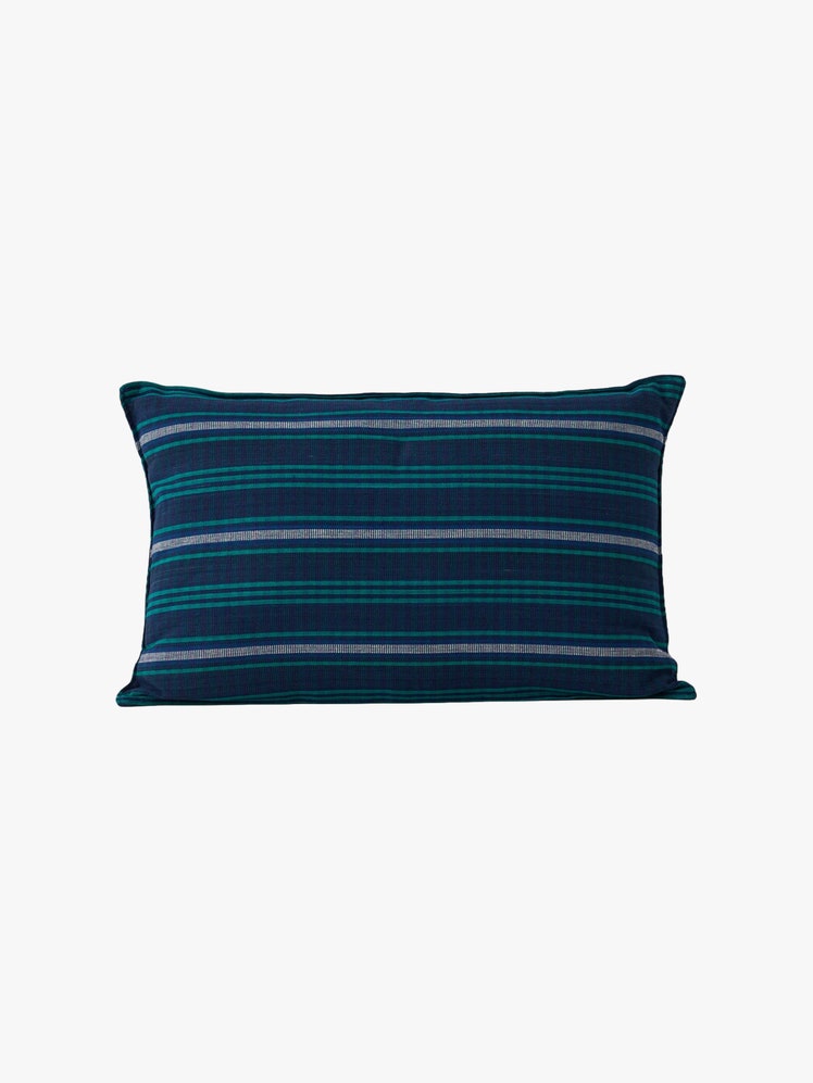 Rectangular cushion in navy blue with green and white stripes.