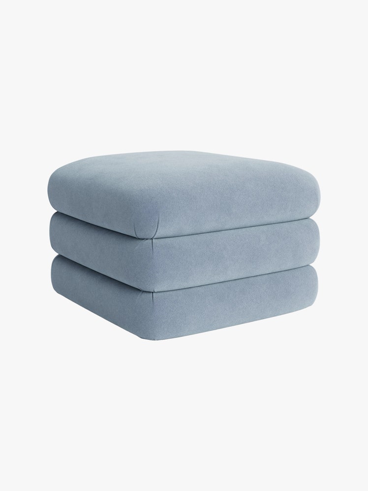 Light blue square channel tufted ottoman.