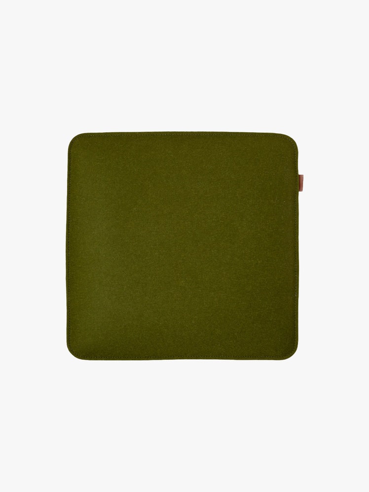 Moss green square merino wool seat pad.