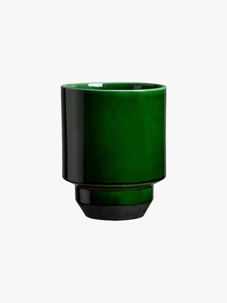 Green ceramic planter with narrowed base.