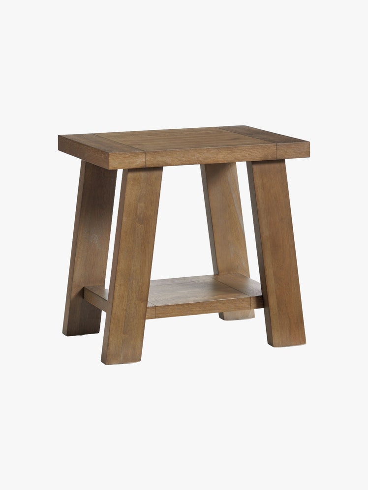 Angular rubber wood table with lower shelf.