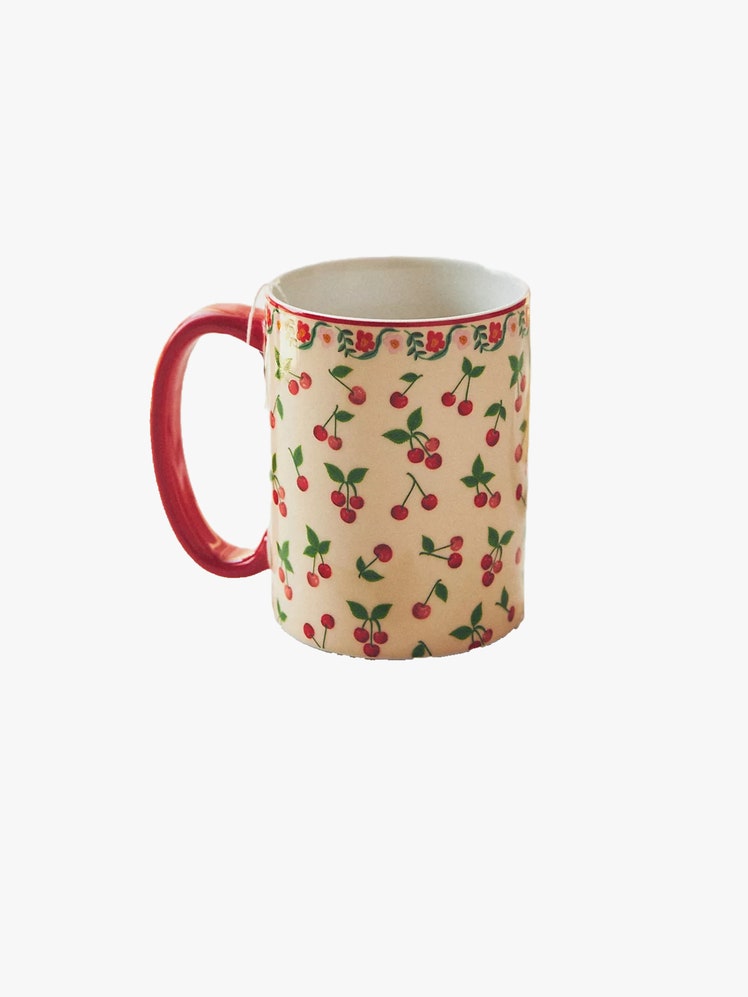 Coffee Mug with cherries printed on it