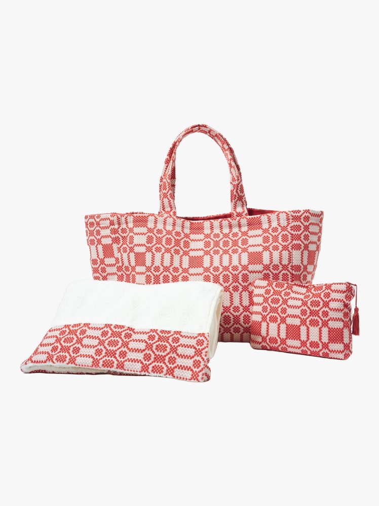 Set of red and white patterned beach items including a cotton woven tote bag a removable interior pouch and a beach...