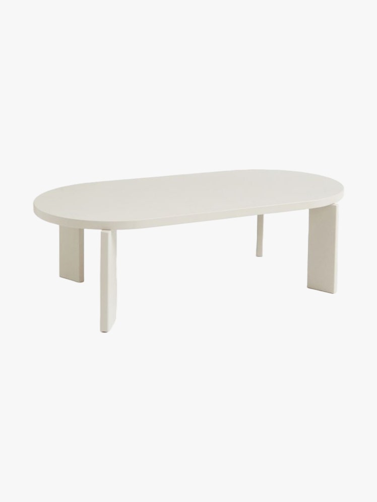 Oval shaped coffee table in durable mediumdensity fiberboard finished with white matte paint.