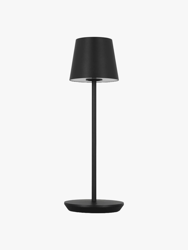 Cordless table lamp in black aluminum with a circular base.