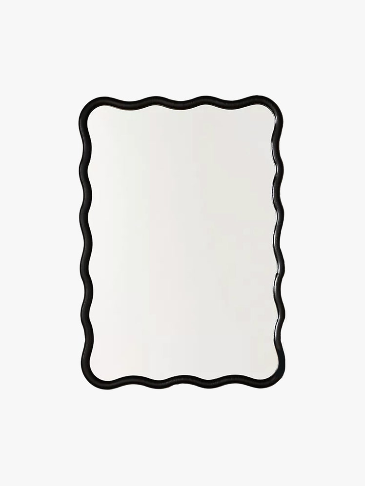 Rectangular mirror in wavy black frame.