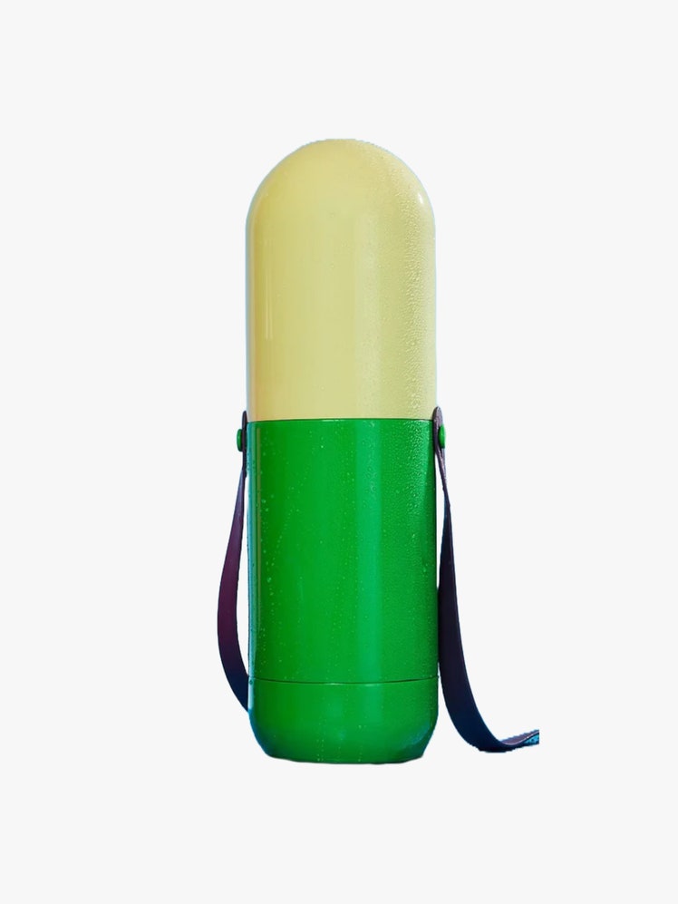 Travel Cooler shaped like a twotone green pill.