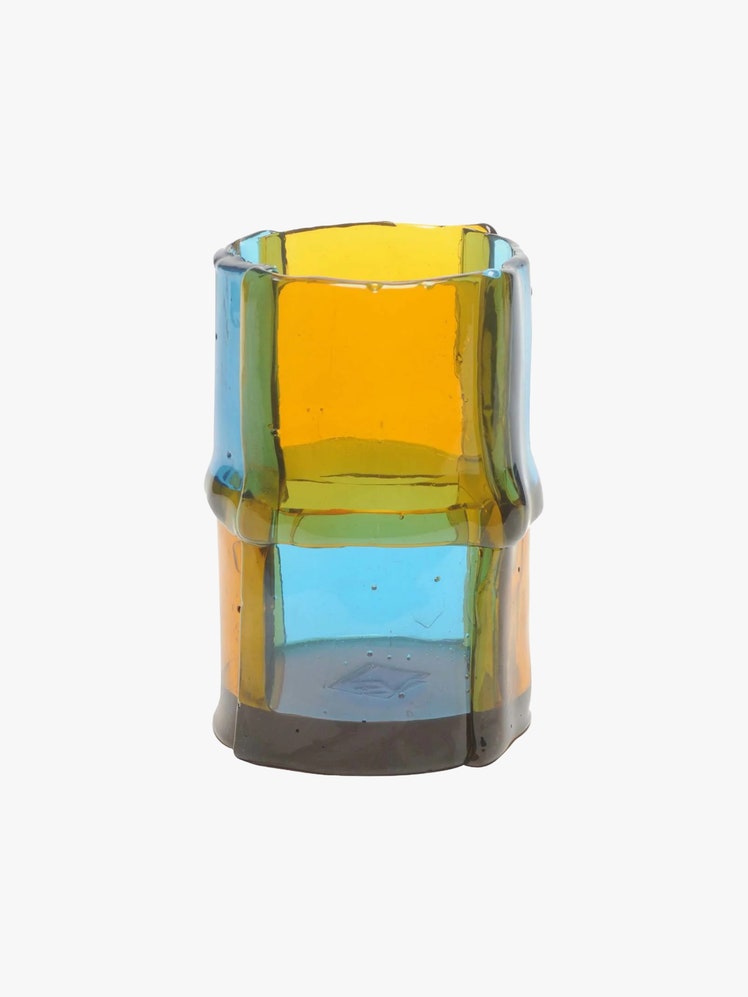 Yellow and blue glass vase shaped like a stalk of bamboo.