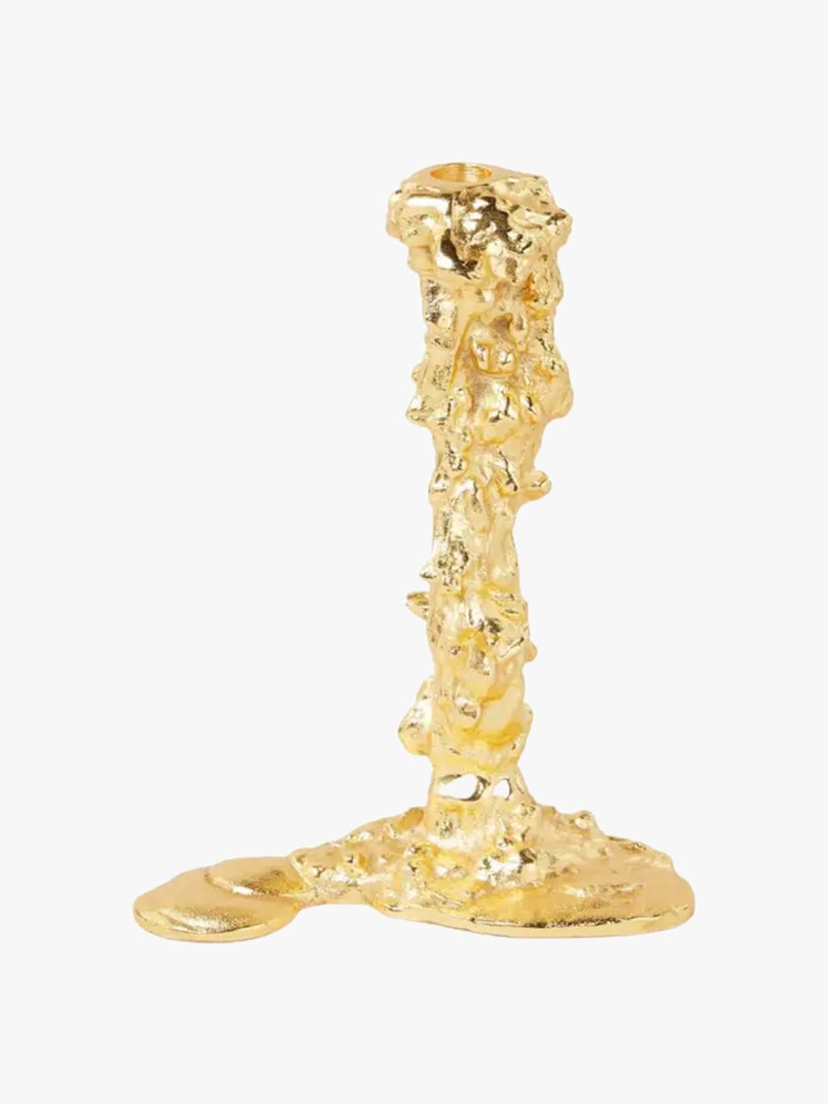 Dripping brass candlestick.