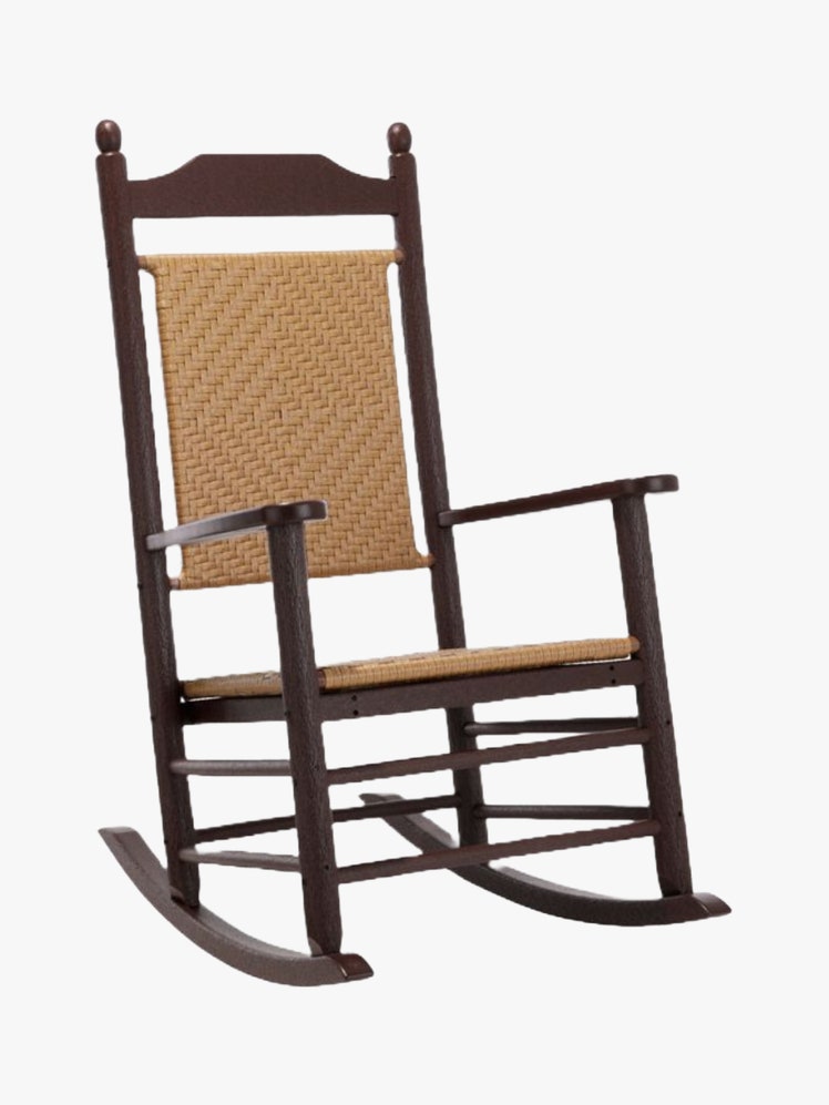 Rocking chair with brown HDPE frame and wicker back and seat.