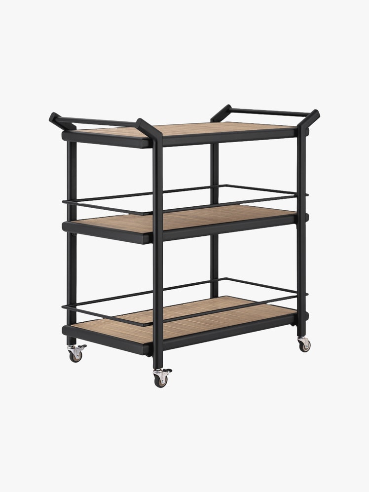 Three tier rolling bar cart with black frame and faux wood slatted shelves.