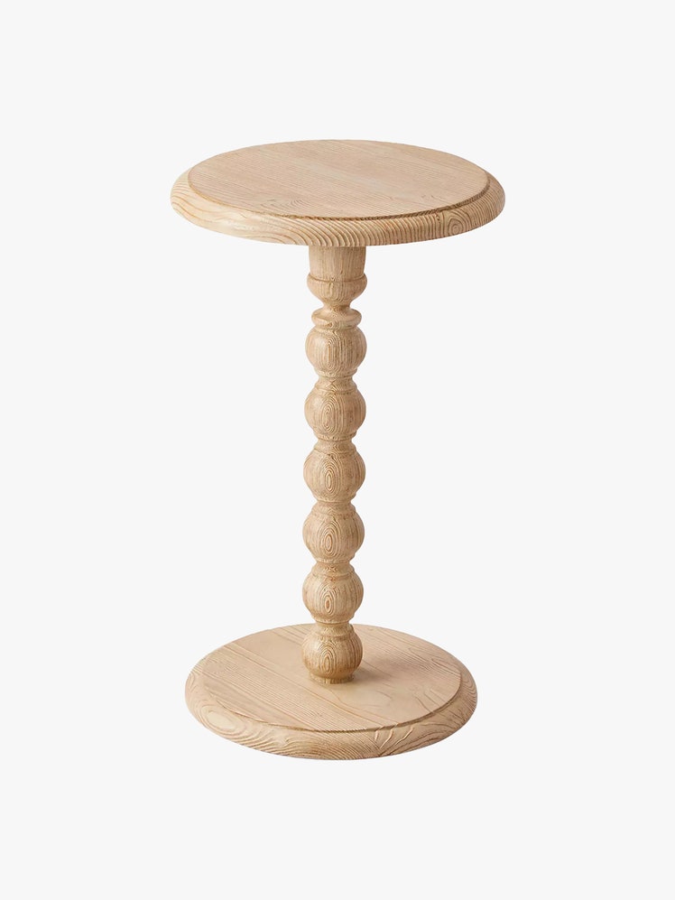 Wooden side table with a circular base and top and a turned center made to look like a string of beads.