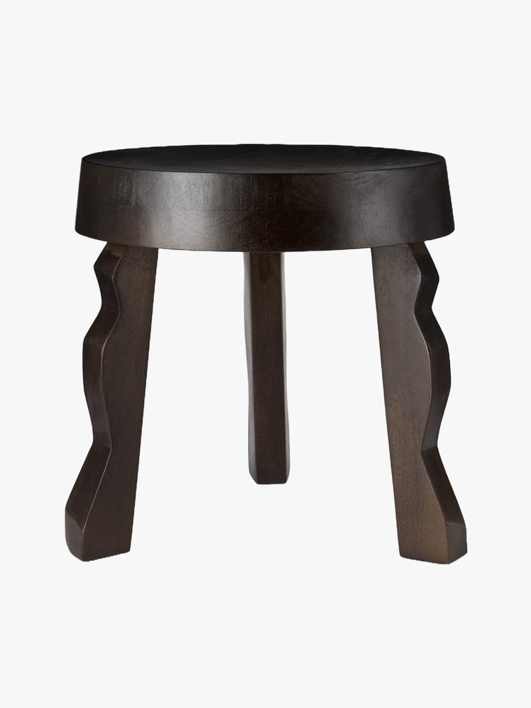 Stained solid mango wood stool with wavy legs in brown.