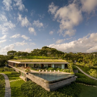 With a Green Roof This Brazil Home Feels Like a Well-Kept Secret