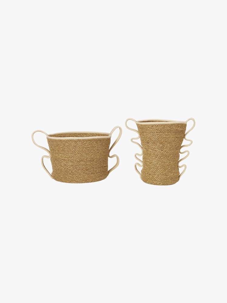 Pair of baskets with wavy handles and a strong woven body.