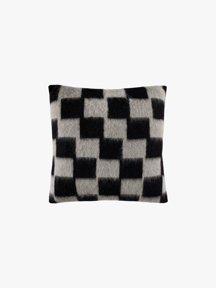 Black and white checkered cushion.