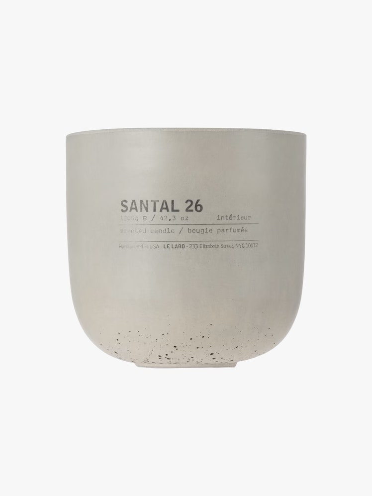 Le Labo Santal 26 candle inside a concrete vessel.