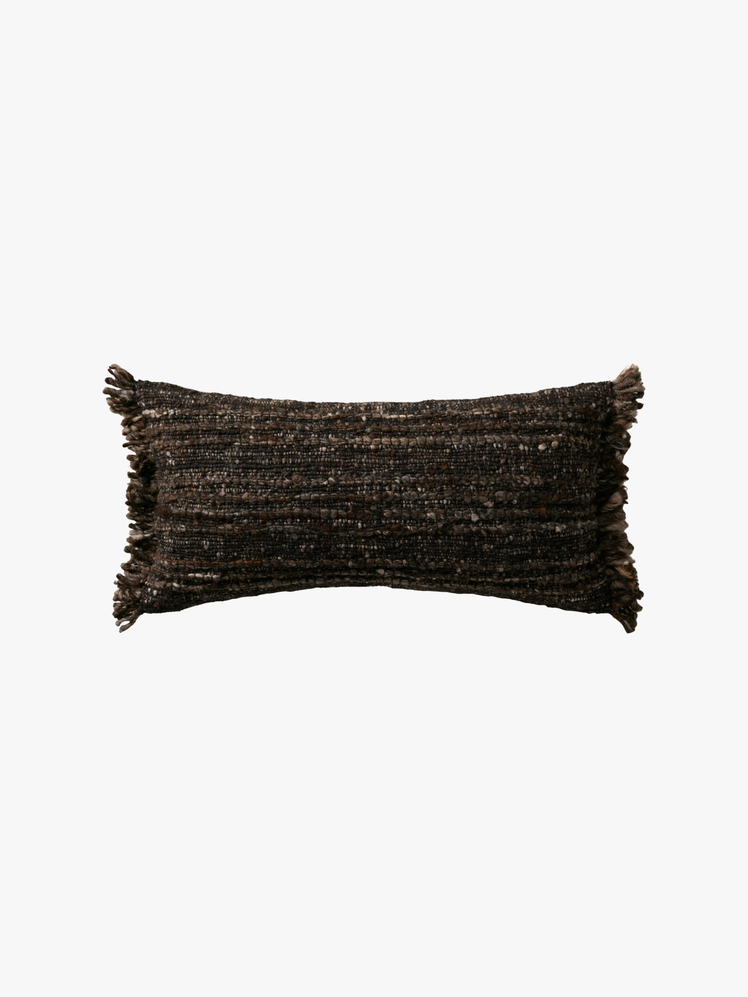 A handwoven textural blend of handspun yarn our Prado Lumbar Pillow Cover features rich cocoabrown hues on the front...