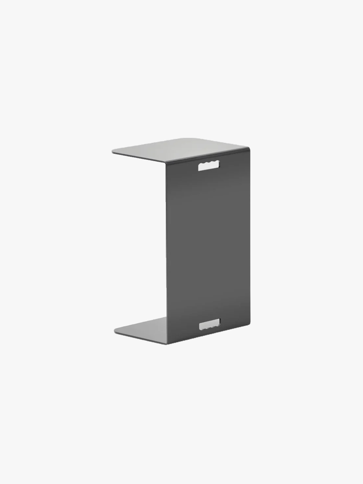 Steel table four different ways as a portable standing desk an overthelap seated work surface an end table or a place to...