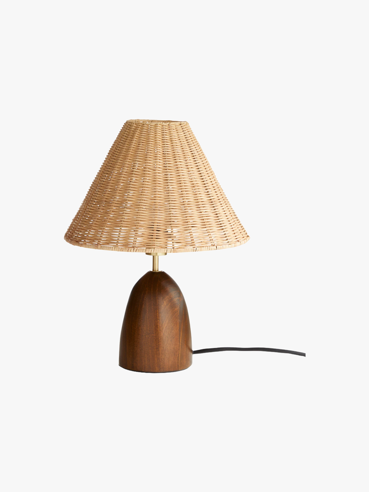 Table Lamp with a sleek wooden base and playful woven shade.