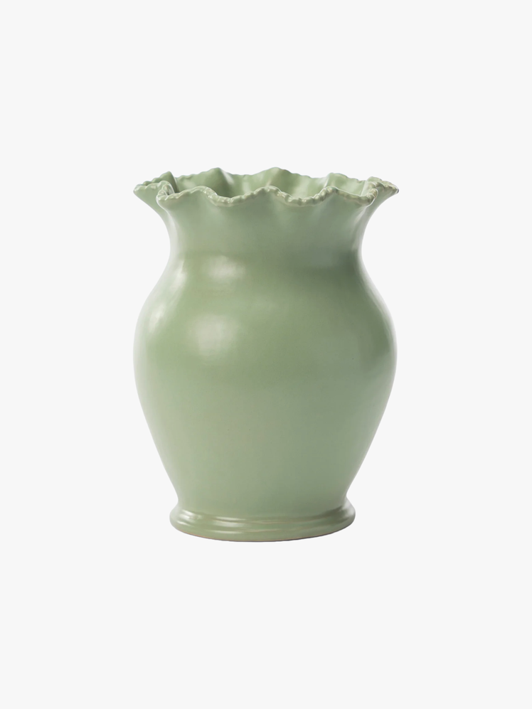 Vase made from ceramic with a green finish and a scalloped opening.