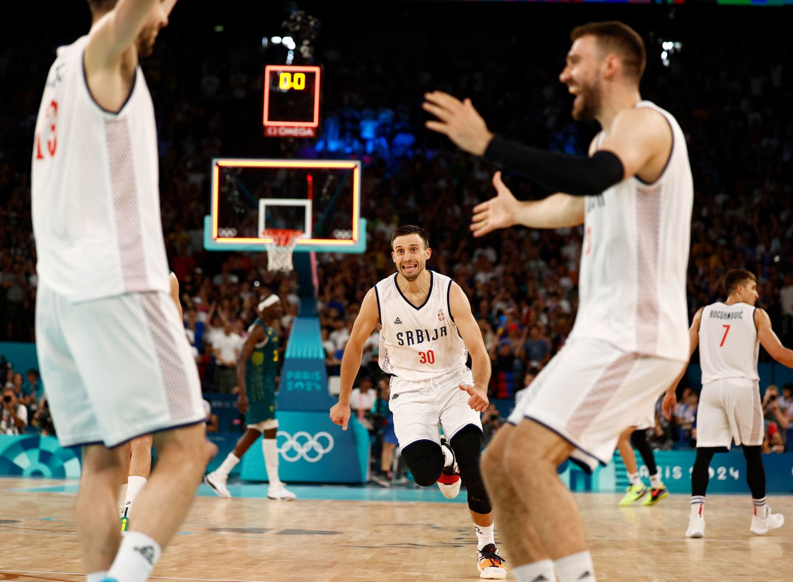 Serbian players celebrate their quarterfinal win over Australia on August 6. <a href="https://www.cnn.com/sport/live-news/paris-olympics-news-2024-08-06#h_9c74de7100be7969d4275ef7b6adaa4a">They came back from a 24-point deficit</a> to win in overtime.