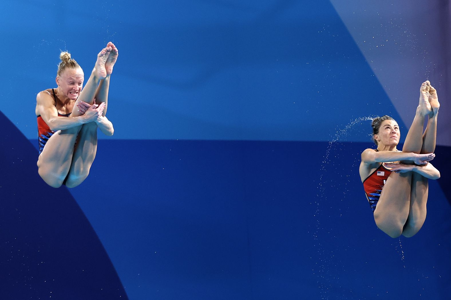 US divers Sarah Bacon, left, and Kassidy Cook compete in the synchronized 3-meter springboard event on July 27. They earned silver — <a href="https://www.cnn.com/sport/live-news/paris-olympics-news-2024-07-27#h_b07fe2a79d726f88ed87e64d20057e38">the United States’ first medal of this year's Games</a>. The gold went to China's Chang Yani and Chen Yiwen.