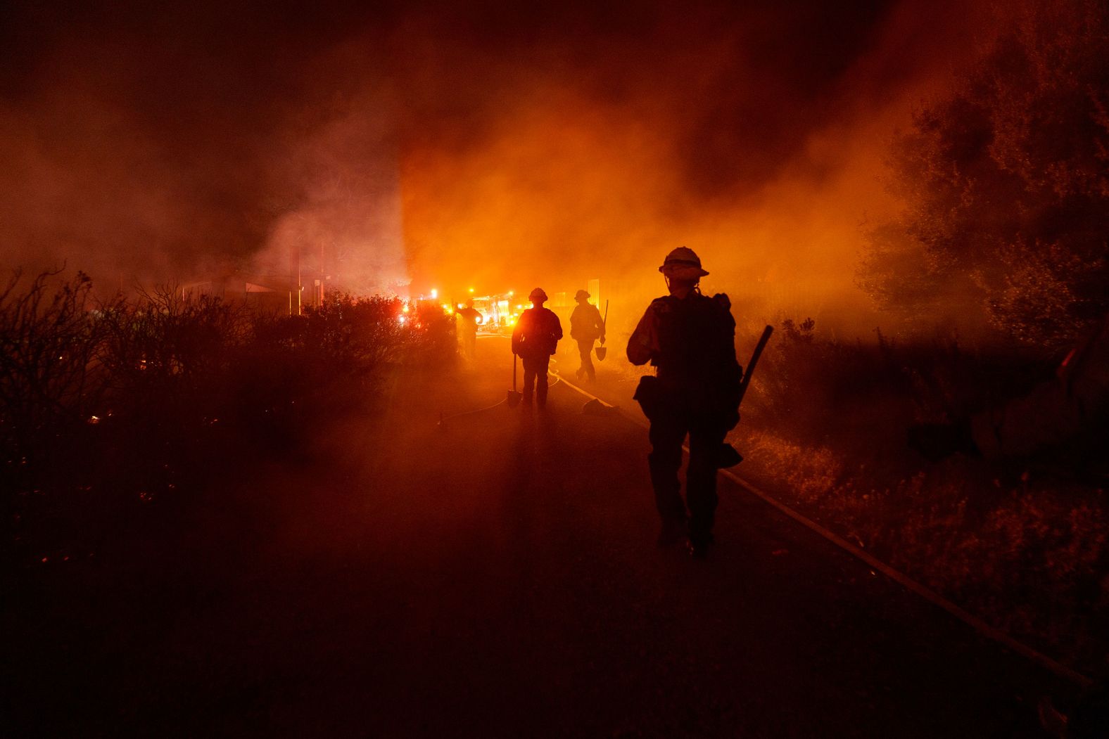 Firefighters work against the advancing Post Fire in Gorman, California, on Sunday, June 16. The wildfire <a href="https://www.cnn.com/2024/06/16/us/los-angeles-post-fire/index.html">forced the evacuations of hundreds of people from a state park</a>, authorities said, and it had <a href="https://www.fire.ca.gov/incidents/2024/6/15/post-fire" target="_blank">burned more than 15,000 acres</a> as of Thursday.