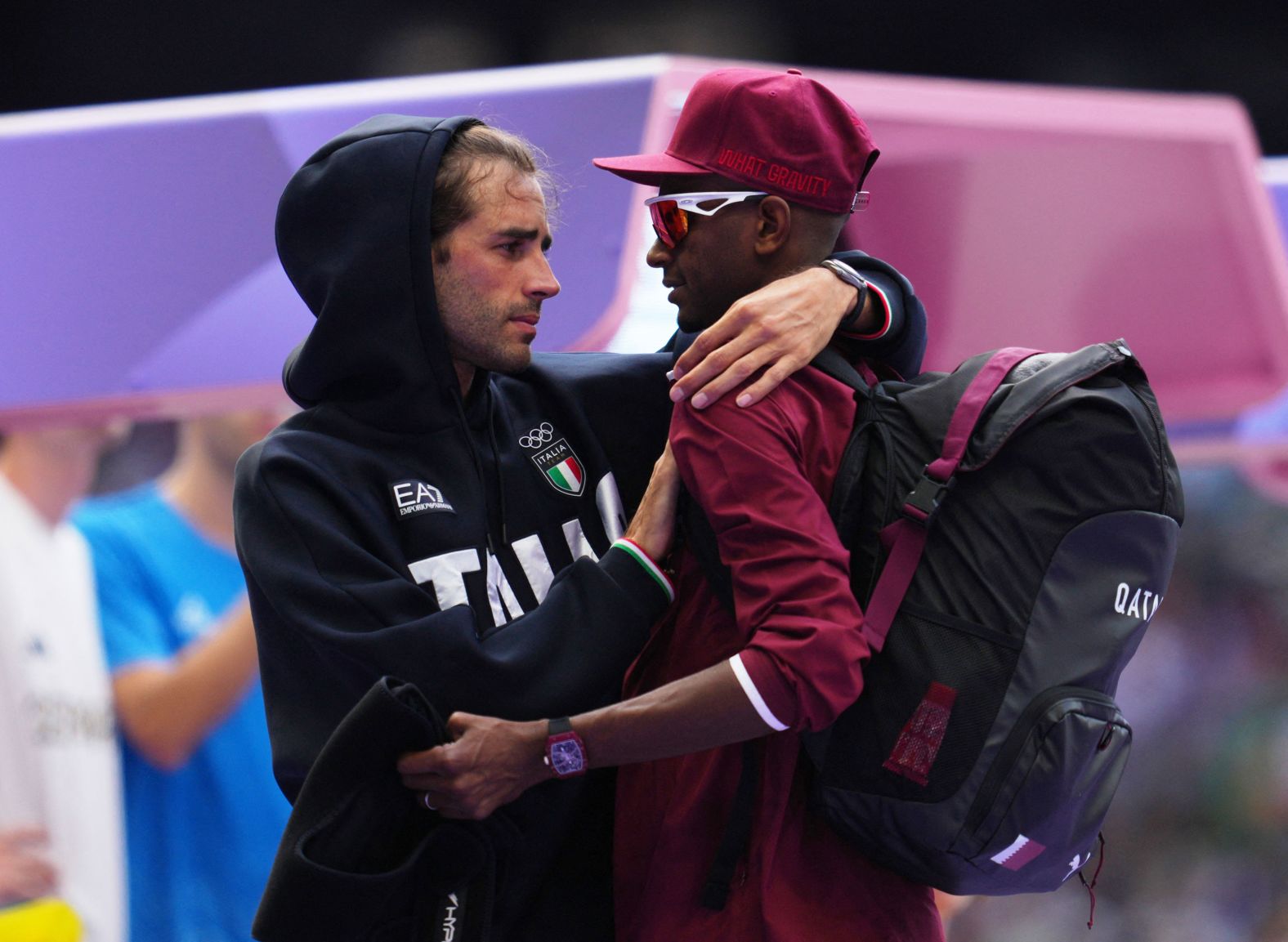 Italian high jumper Gianmarco Tamberi, left, speaks with Qatar's Mutaz Essa Barshim during the qualification round on August 7. The two shared a gold medal in the event three years ago in Tokyo. When Barshim pulled up with an apparent injury in Paris, <a href="https://www.cnn.com/sport/live-news/paris-olympics-news-2024-08-07#h_8ace76e36b6f5578104aedf12feead39">Tamberi was the first to check on him</a>. Barshim was able to recover and qualify for the final.