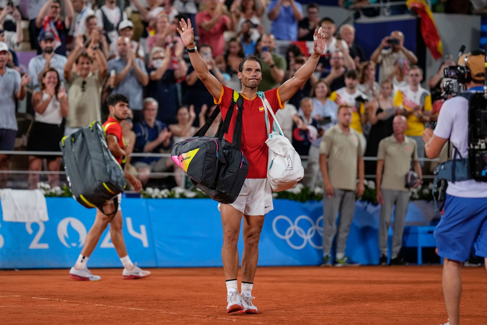 Spain's Rafael Nadal waves goodbye after he and doubles partner Carlos Alcaraz <a href="https://www.cnn.com/sport/live-news/paris-olympics-news-2024-07-31#h_0a2640ae0ab3dcdd672021796d4f2c1b">were knocked out in the quarterfinals</a> by the United States' Austin Krajicek and Rajeev Ram on July 31. Nadal’s future in tennis is uncertain as injuries continue to plague him.